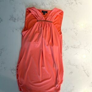 Small salmon coloured shirt